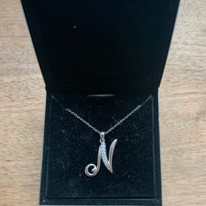 silver necklace w/ N pendent with glass diamonds